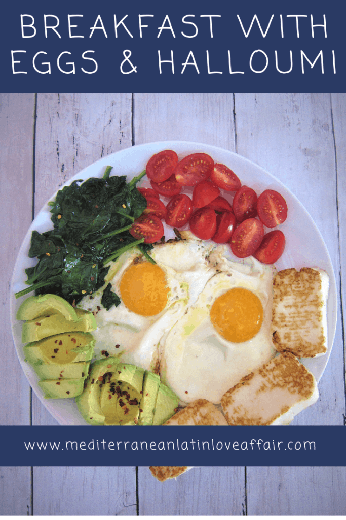 Low carb breakfast made with eggs, fried halloumi slices, spinach, avocado and tomatoes