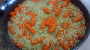 Prepping tray with orzo and carrots