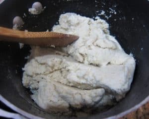 Preparing the dough for the corn pie casserole