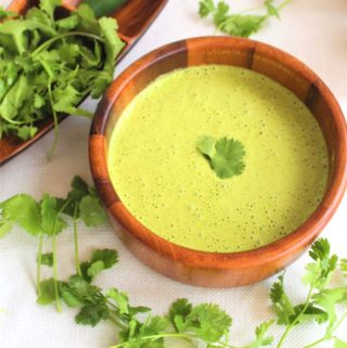 Peruvian Salsa Verde or Aji Verde, a green spicy sauce that has huacatay plant