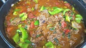 Ground beef cooked with vegetables for the Okra Bake