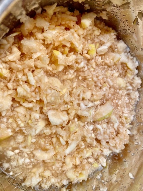 Chopped quinces in a pot ready to make jam