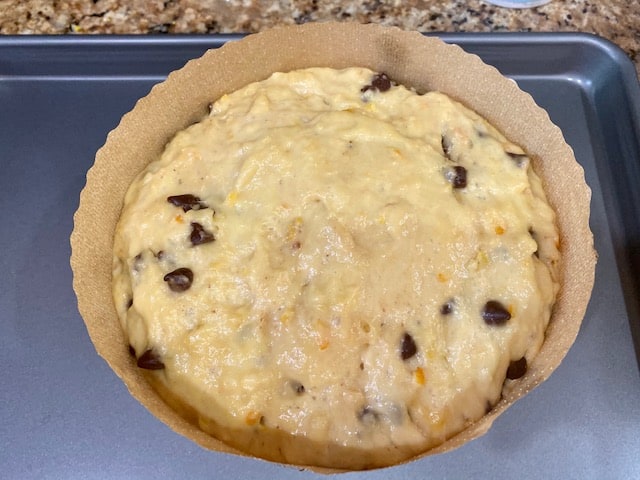 Panettone dough in paper mold after 1.5 hours of rising. 
