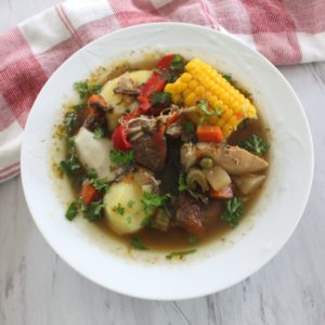 A plate of Christmas Soup, Bolivian Picana. Soup is hearty and has both chicken and beef.