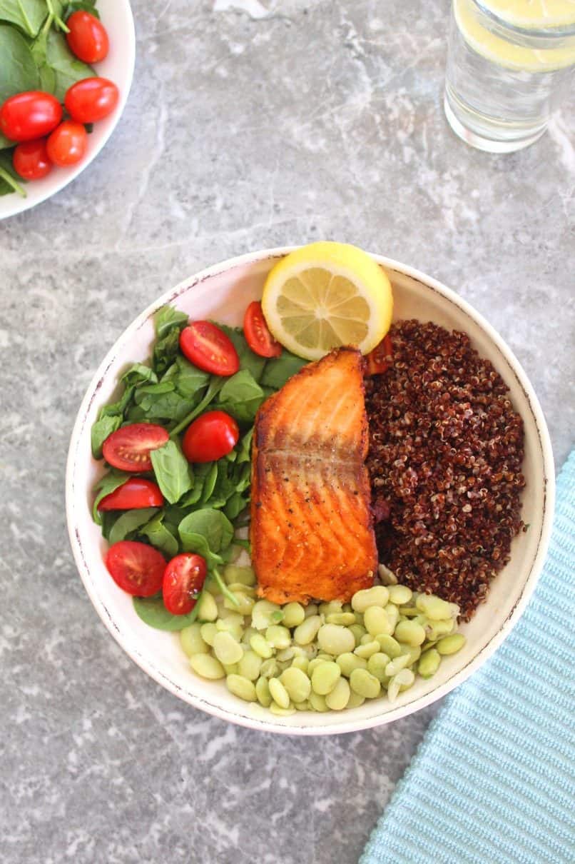 Salmon Red Quinoa Bowl with Green Lima Beans, Spinach and Grape Tomatoes.