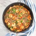 Skillet with quinoa pasta and shrimp tomato sauce
