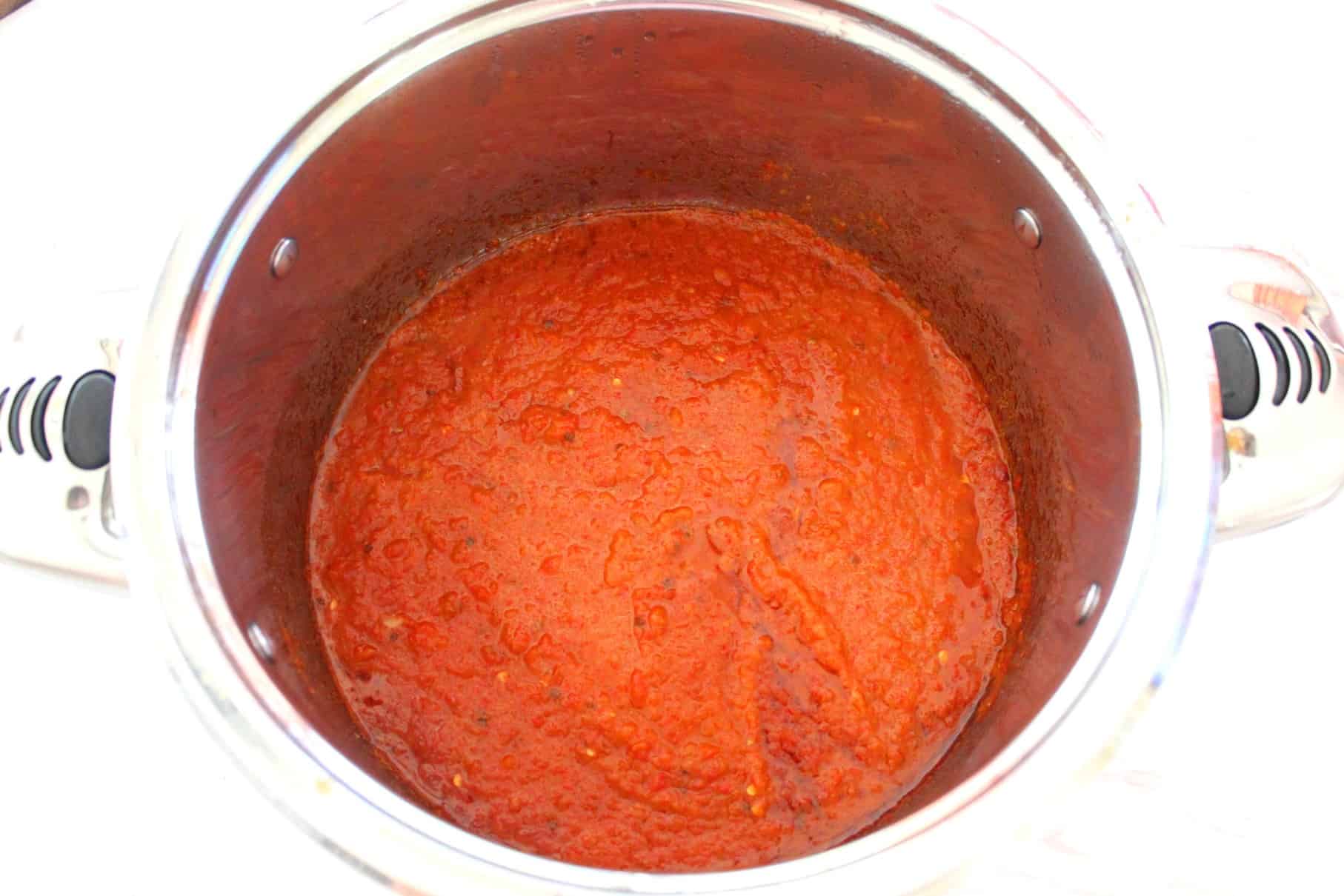 A pot of ajvar red pepper sauce, shown after it has simmered down!