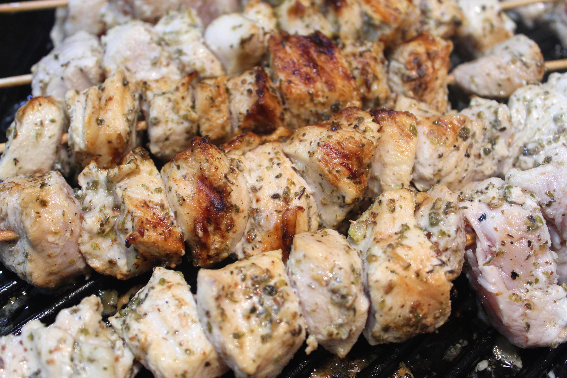Chicken Kabobs on the cast iron grill cooking
