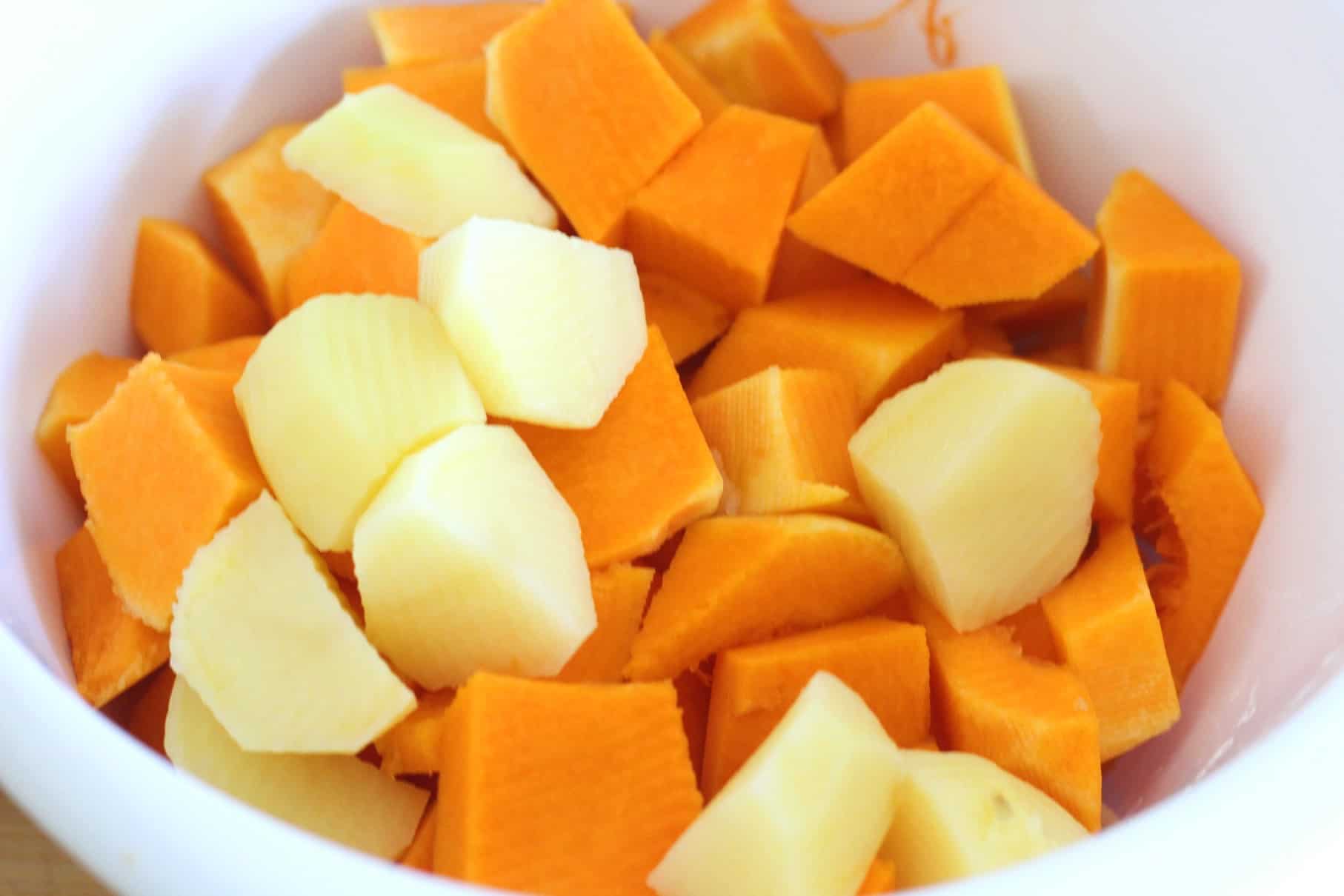 Chopped potatoes and butternut squash ready to cook.