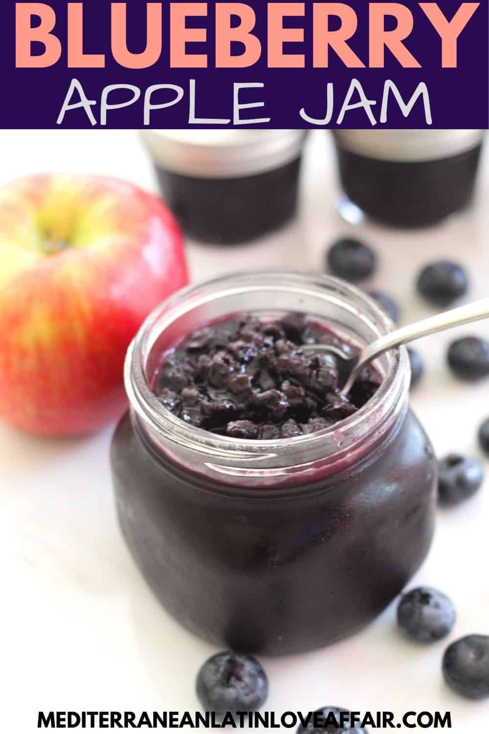 An image prepared for Pinterest that shows a picture of the Blueberry Apple Jam in a jar. On top is a title bar and on the bottom the website link.