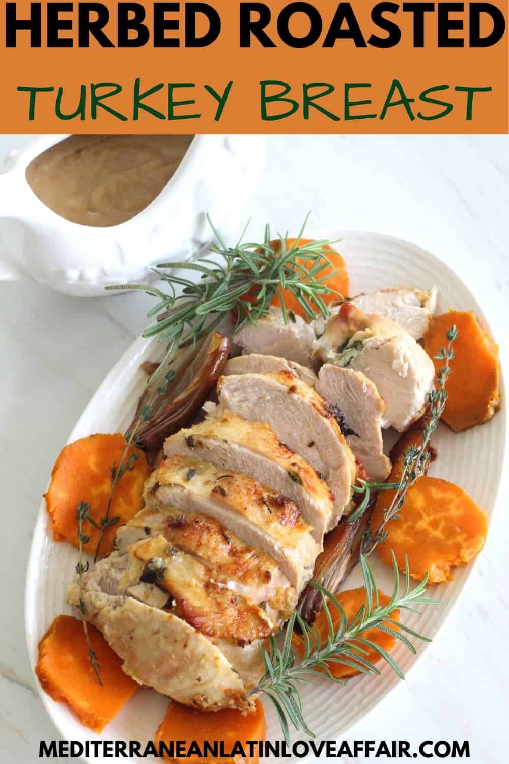 Herbed, Roasted Turkey Breast sliced on a platter. 