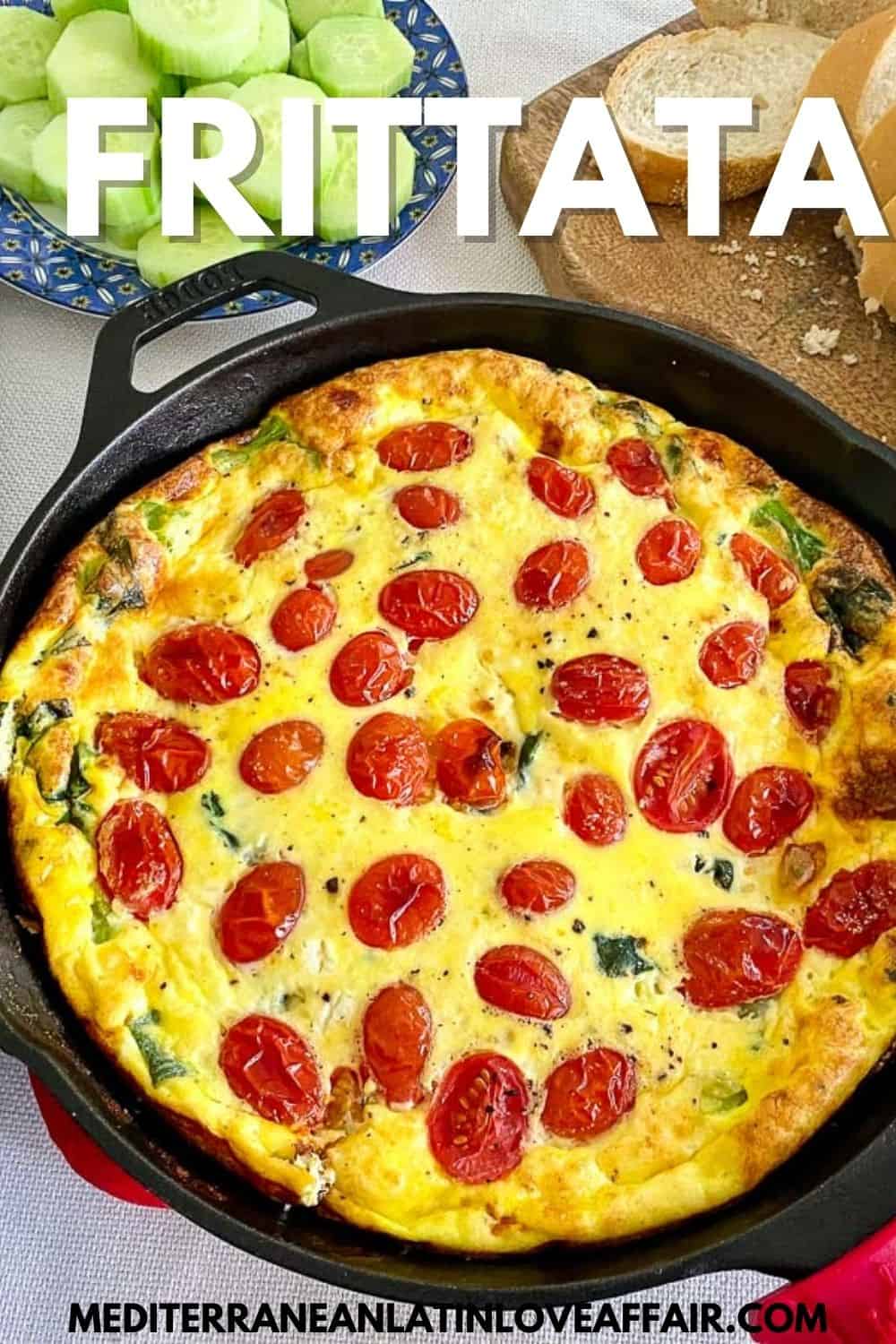 An image prepared for Pinterest. It shows a picture of the frittata in the middle on a cast iron skillet, there's some sliced cucumber and bread on the background. There's a title bar that reads Frittata on top and the website link on the bottom.