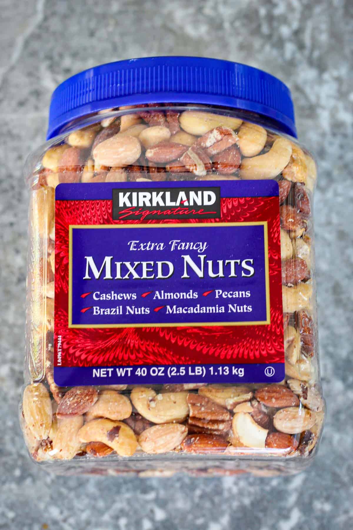 A container of mixed nuts, about 2.5 lbs. 