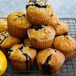Just baked muffins on a cooling rack. They're stacked on top of each other