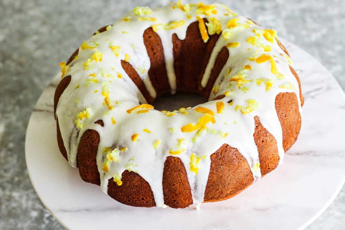 A bundt cake made with Meyer Lemons and topped with icing.