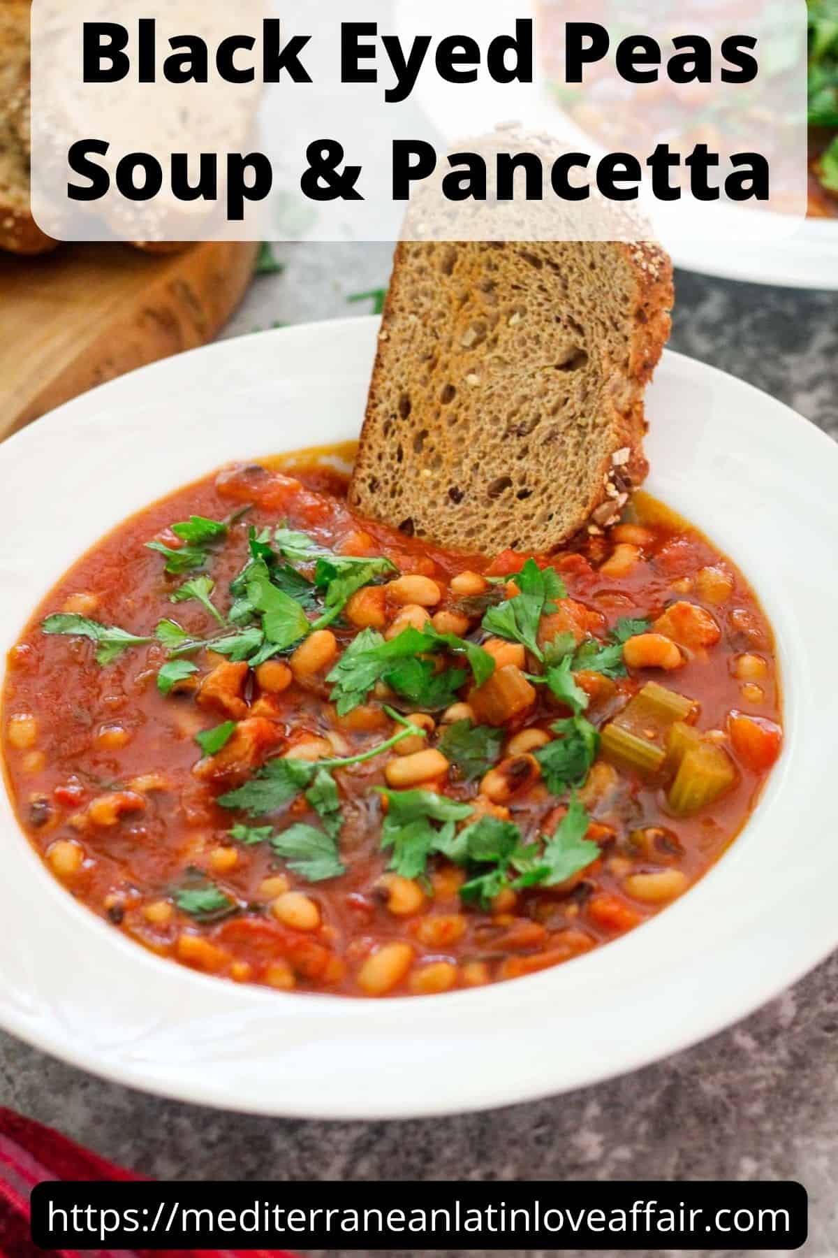 An image prepared for Pinterest, it shows a picture of the soup on a white plate, garnished with bread and fresh parsley. The picture has a title bar saying Black Eyed Peas Soup & Pancetta and at the bottom there's a website link.