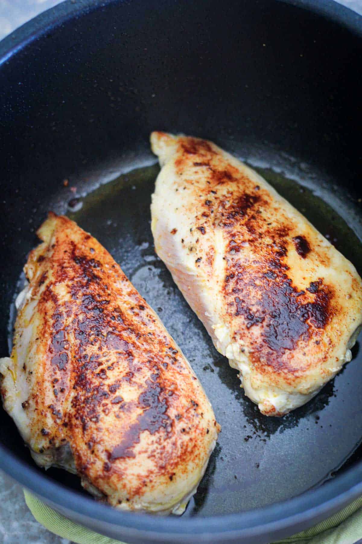 Browning chicken breast in the pressure cooker. Chicken breasts seem completely cooked on one side and are cooking on the other side. 