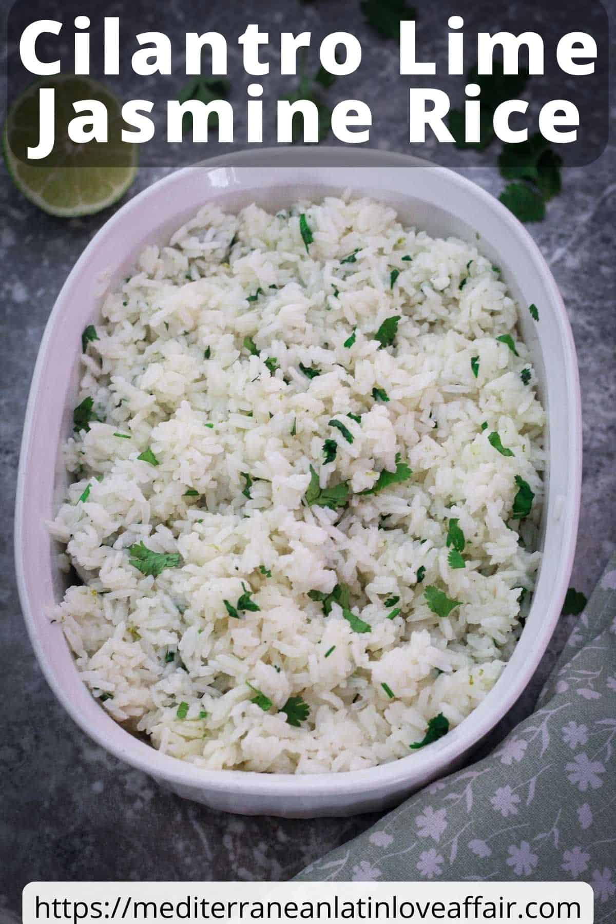 An image prepared for Pinterest. It shows a picture of a white ceramic bowl with cilantro lime jasmine rice with more garnishes around the bowl. There's title bar over the picture and a website link at the bottom.