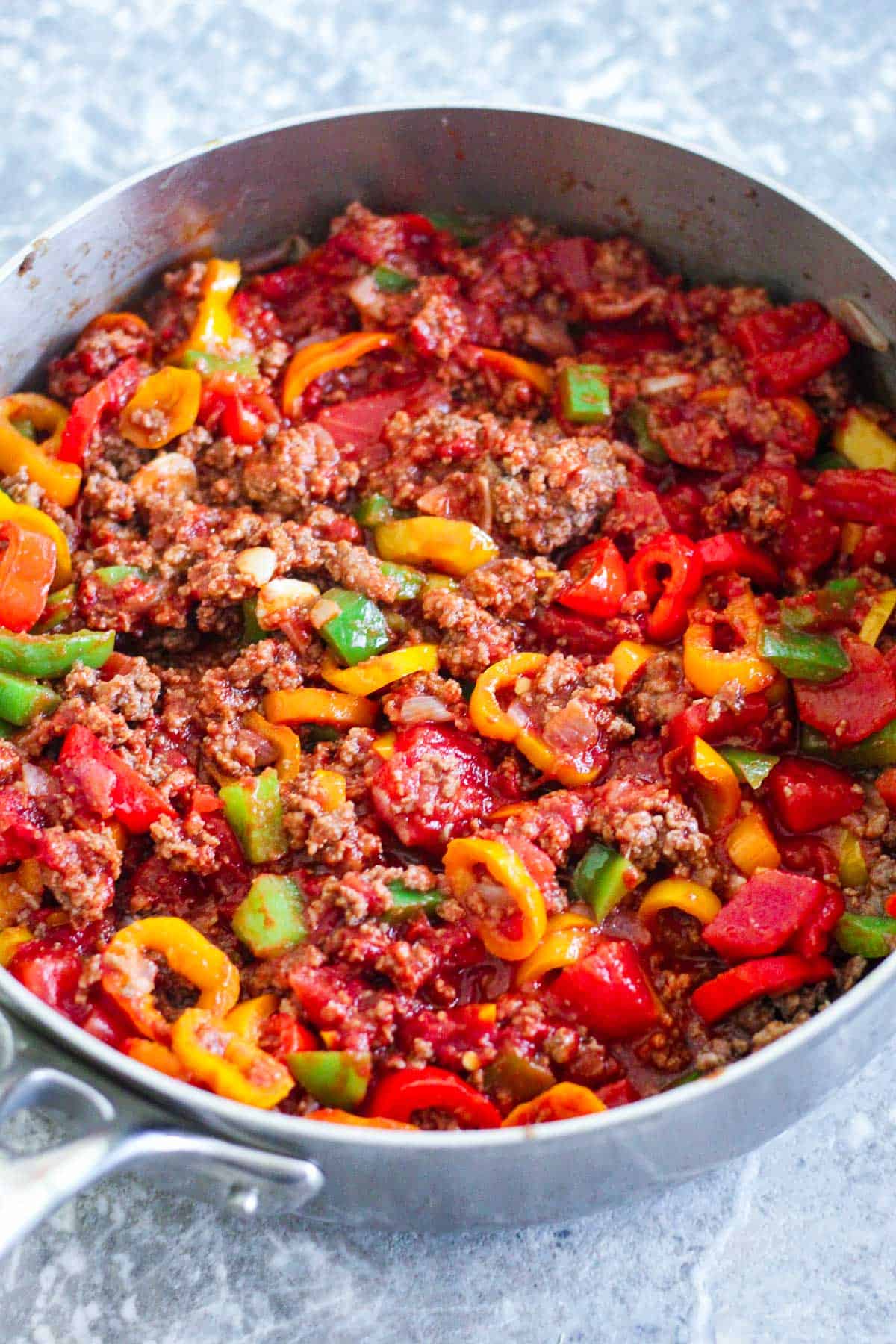 Cooked peppers with beef and tomatoes.