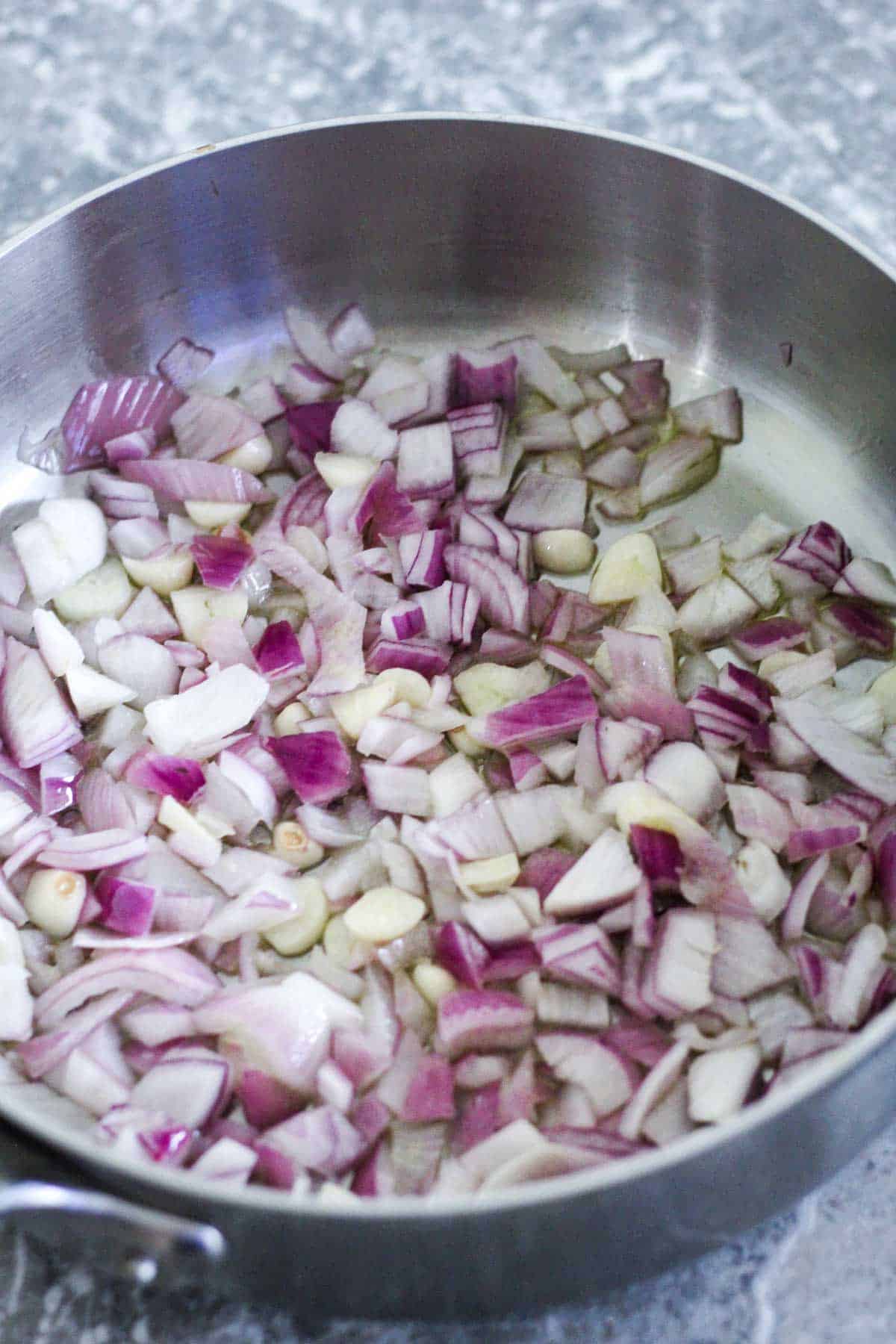 Sauteing onion and garlic in olive oil. 