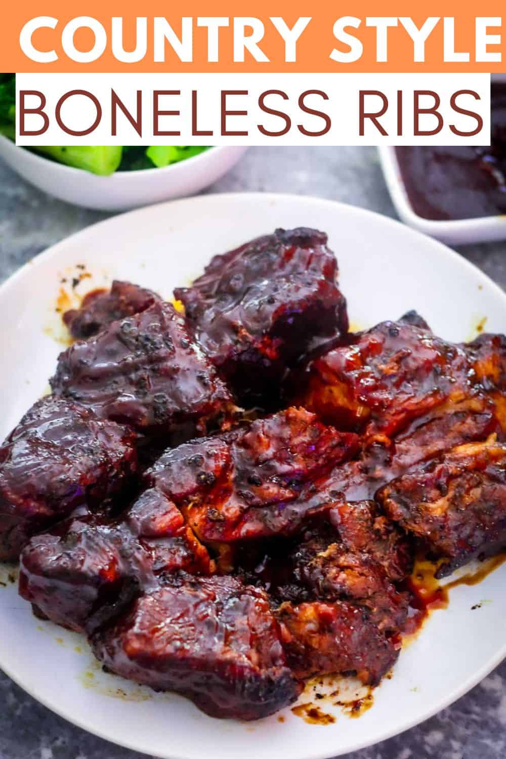 An image created for Pinterest, it shows a picture of country style boneless ribs cooked in the Dutch Oven and covered in BBQ sauce. There's a title bar over the picture. 