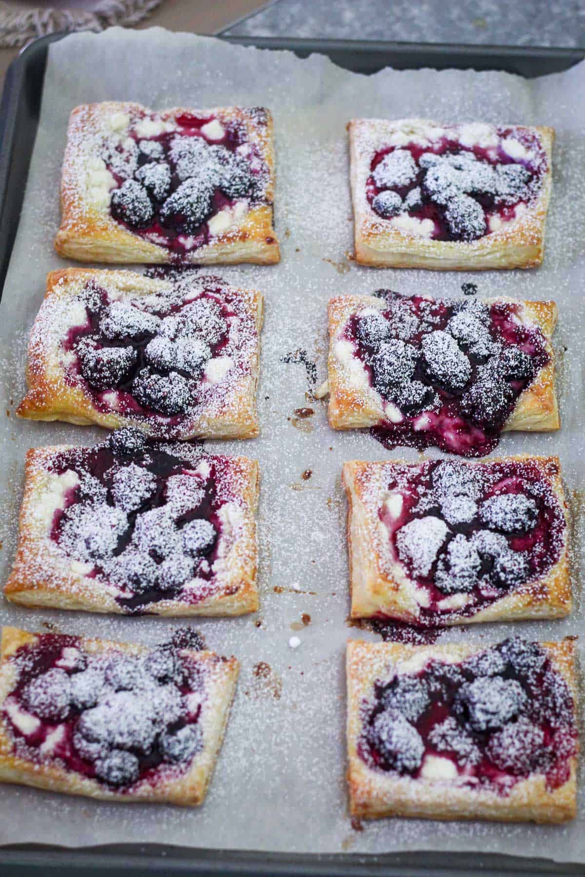 Tarts after baking, sprinkled with powdered sugar.
