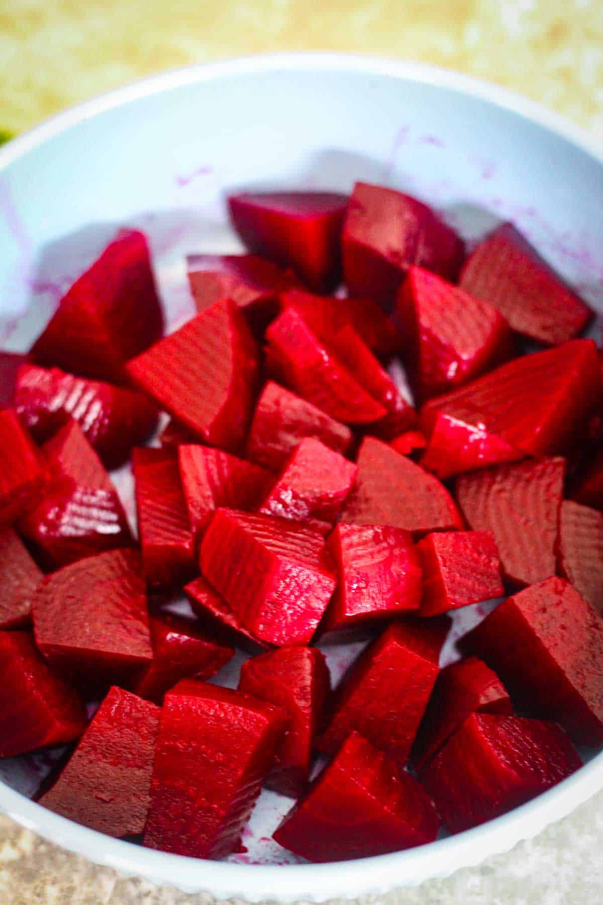 Cooked beets, cut in cube shape.
