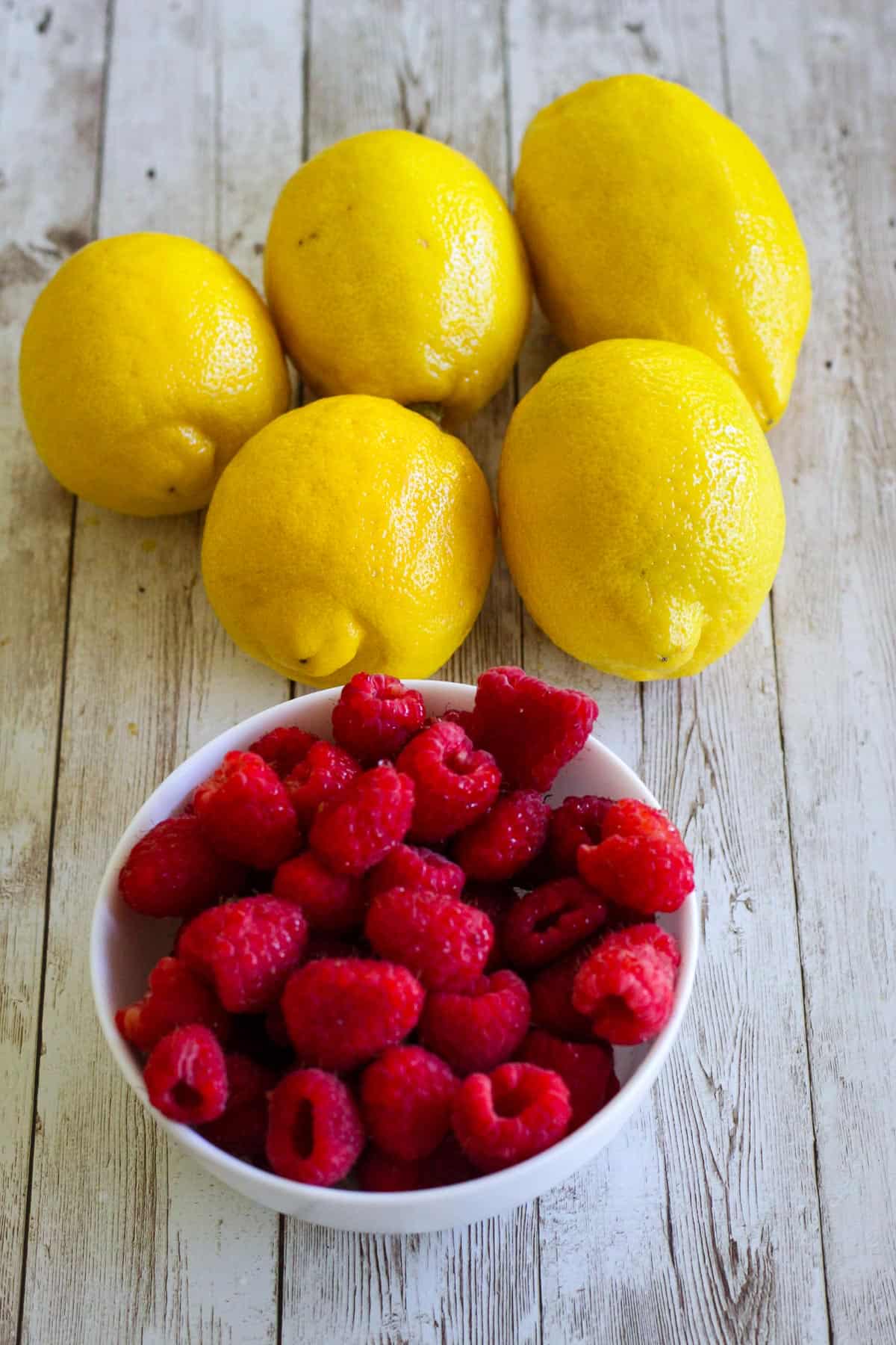 Fresh lemons and raspberries. 