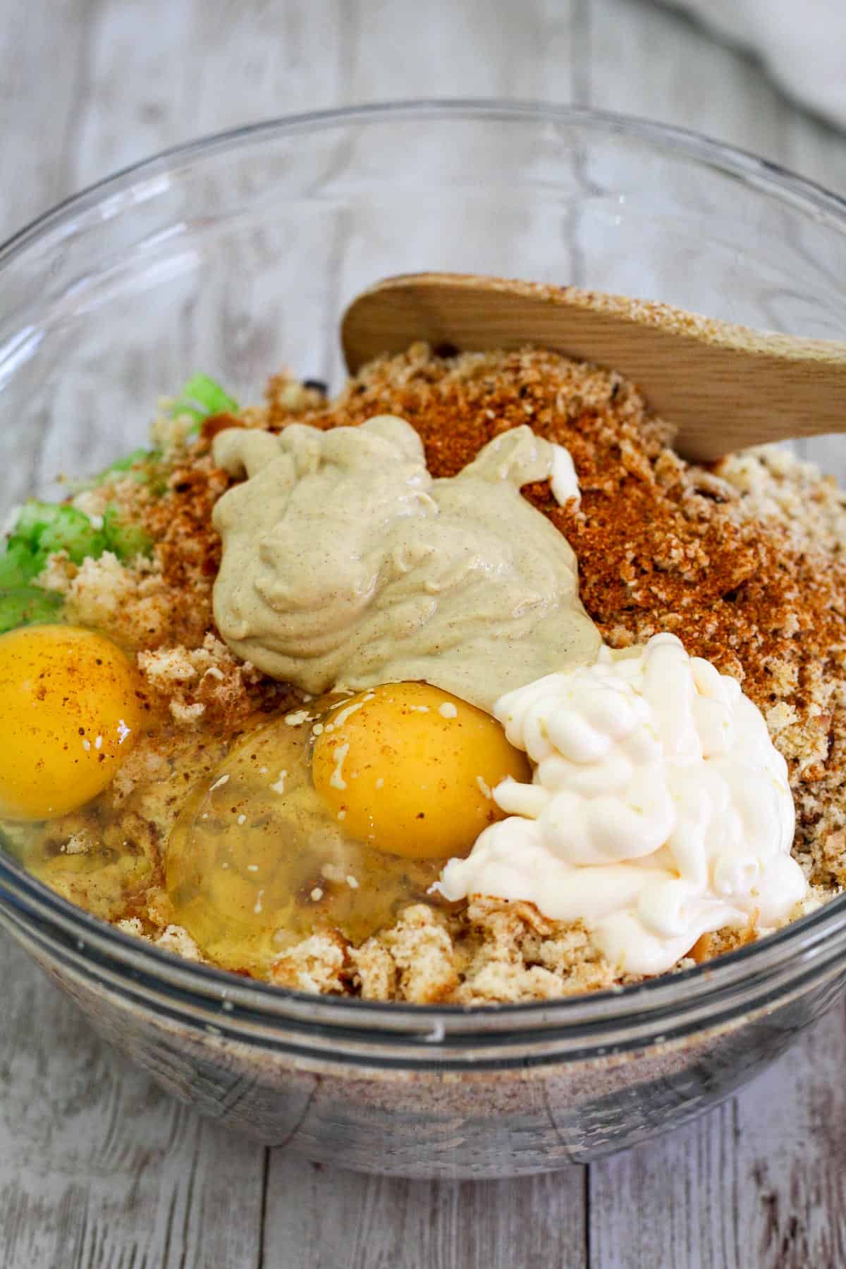 Mixing all the ingredients in a glass bowl. 
