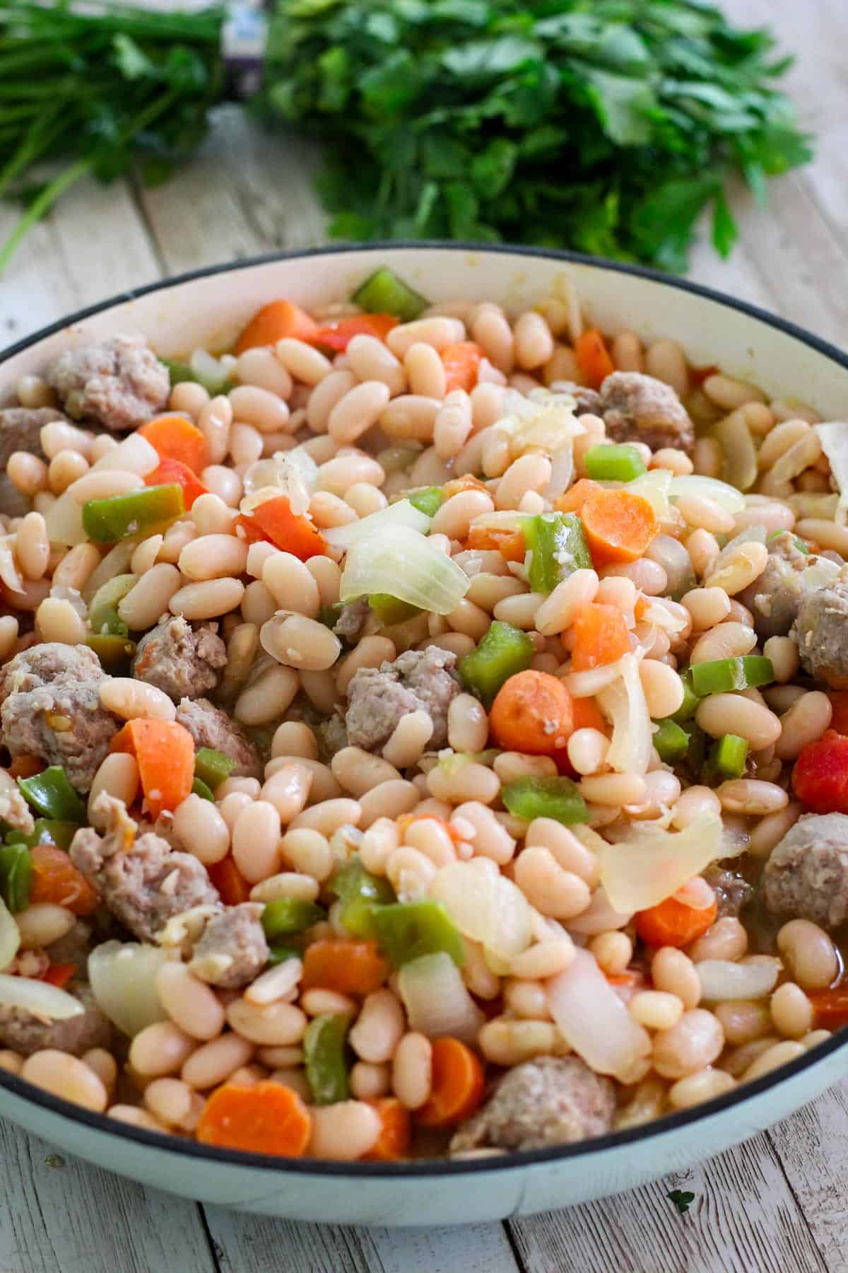 Step in the cooking process where beans are added in.