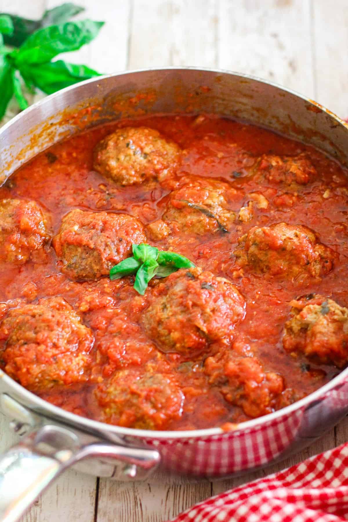 Meatballs cooked in marinara sauce. 