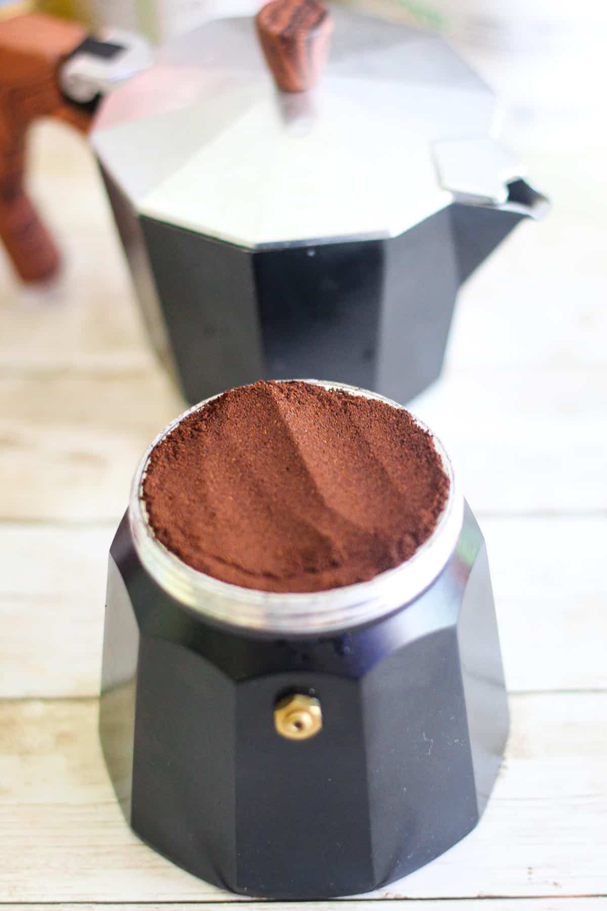 Coffee mocha pot, with dense coffee showing before closing the pot. 