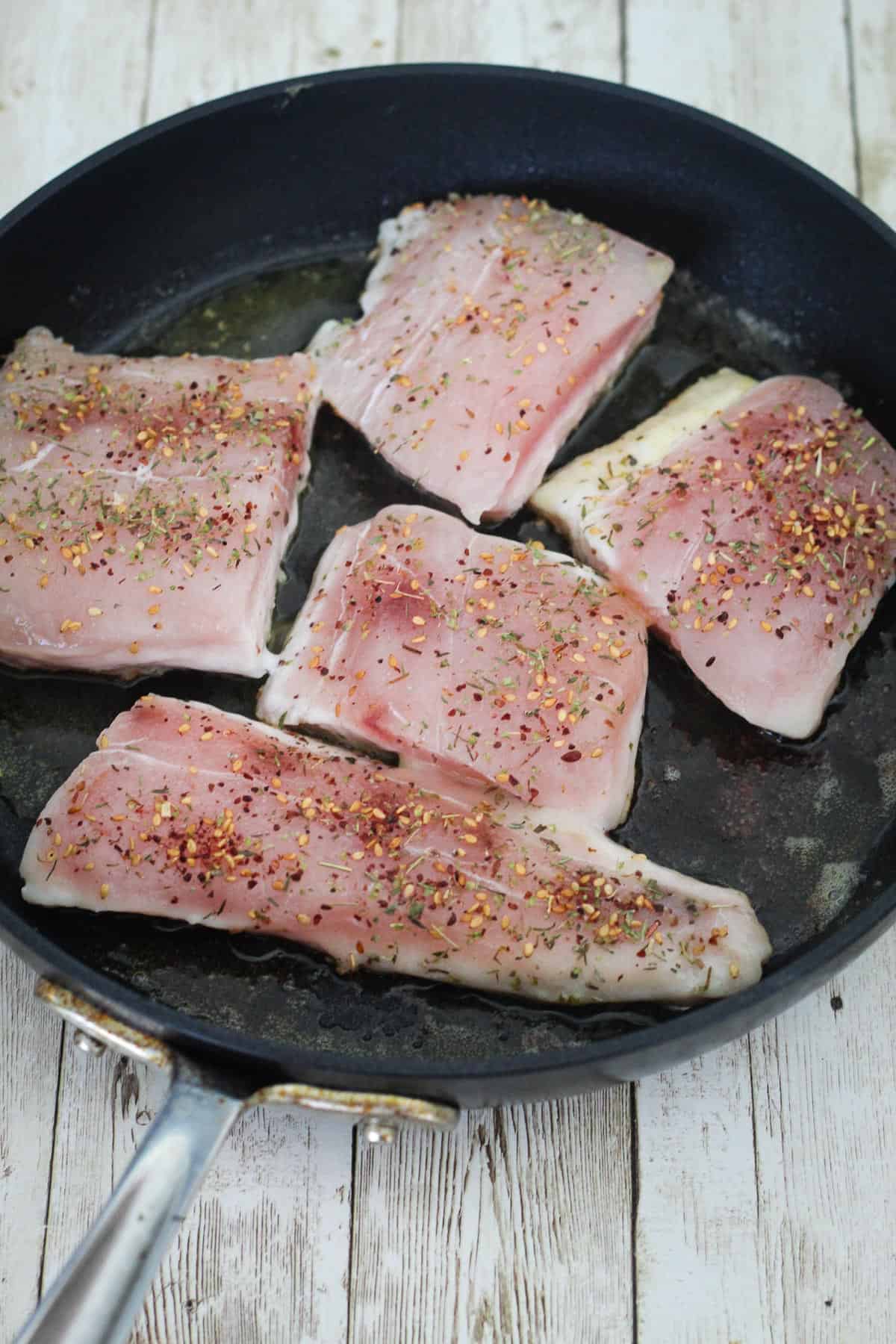 Searing mahi mahi on one side.
